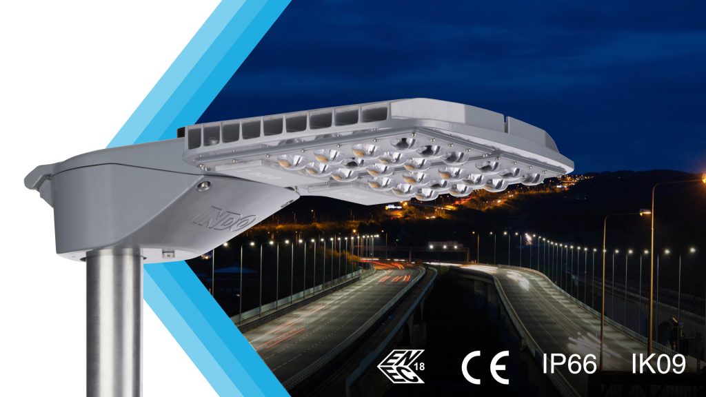 AIR3 LED street light illuminating a motorway at night, with ENEC, CE, IP66 and IK09 marks