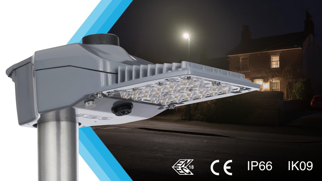 SiCURA LED street light illuminating a residential street at night, with ENEC, CE, IP66 and IK09 marks