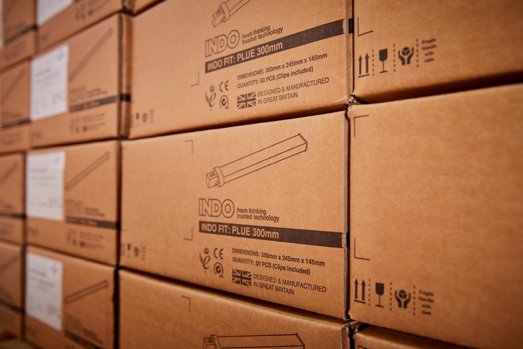 Stack of INDO product boxes marked designed and manufactured in Great Britain