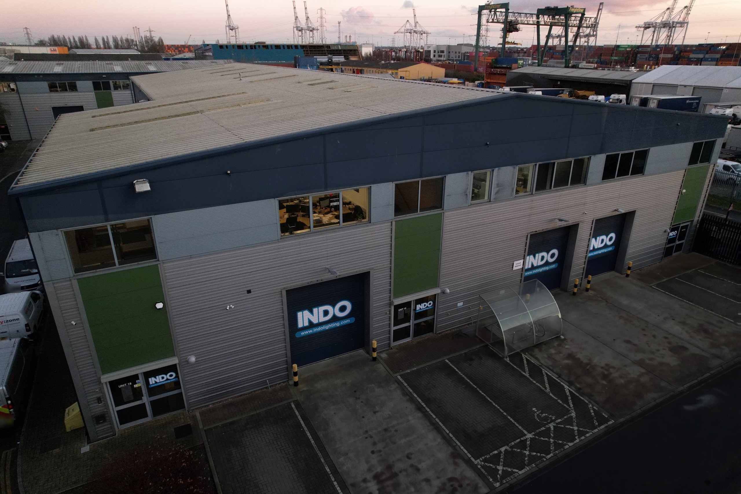 Aerial view of the INDO building in Southampton with the docks behind